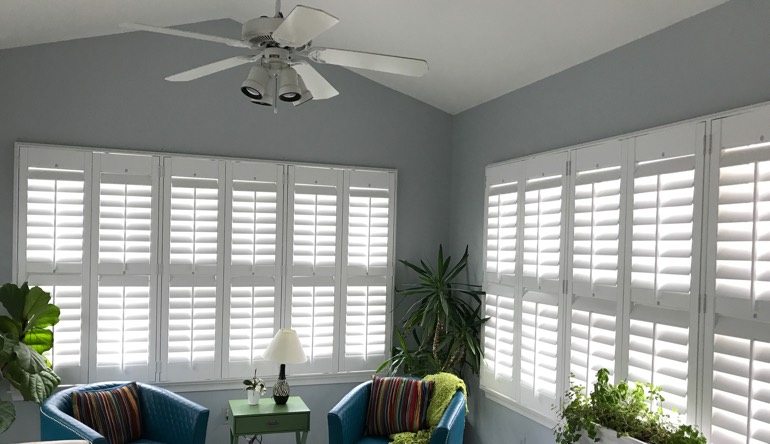 Hartford living room with fan and shutters